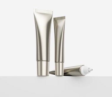 3d Gümüş Kozmetik Krem Tüpleri Ürün Podyumunda Ayakta Duruyor Beyaz Arka plan 3d Görüntü