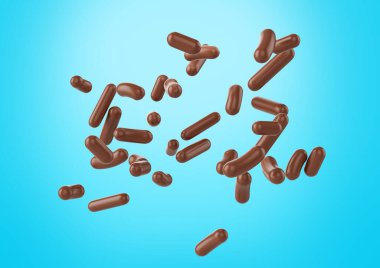 Kek, dondurma ve tatlı için çikolata parçacıkları Cyan 'ın arka planına düşüyordu.