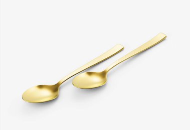 Pürüzsüz kıvrımları ve düz sapı olan iki altın kaşık yemek için mükemmel. 3d illüstrasyon