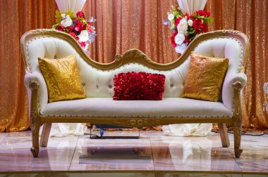 wedding setting with vintage seat for bride and groom white eventrich decorated