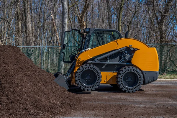 stock image compact track loader mulch bio woods raw tractor wooden bio brown