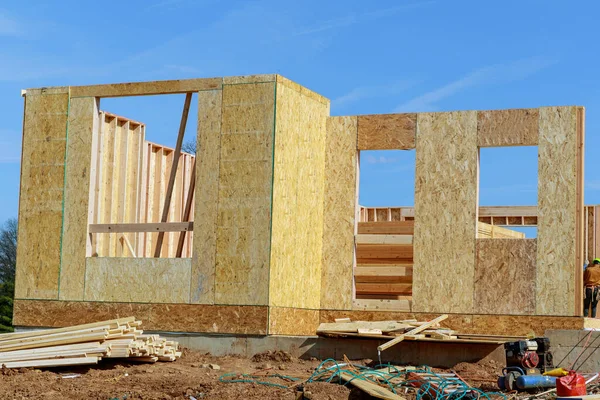 stock image walls of a plawood house against the blue sky wood truss building real