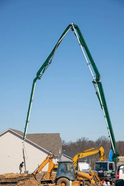 stock image elephant crane or concrete pump crane job tube truck pumping