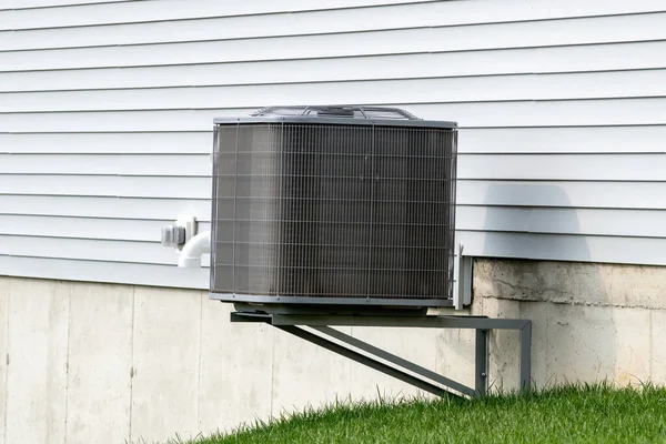 air conditioner unit attached to residential property fan power modern