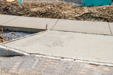 freshly poured cement sidewalk new work street asphalt materials clipart