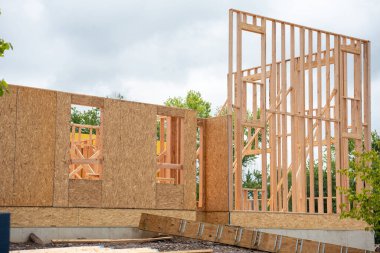 frame and walls of a plywood house new material timber clipart