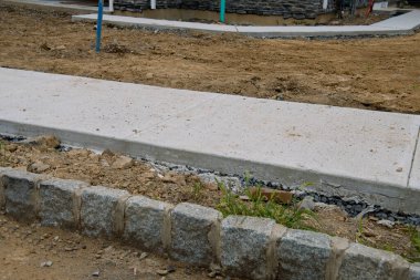 Yeni beton kaldırımlar açık hava gri zemin