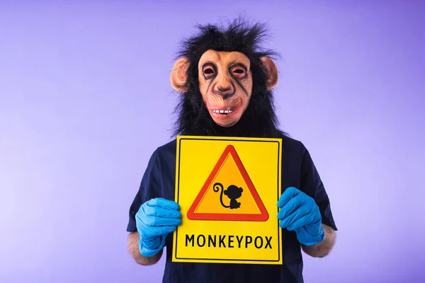 Disguised Person Monkey Mask Doctor Suit Holding Sign Danger Sign — Stock Photo, Image
