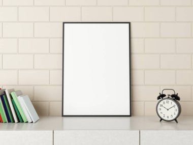 Masanın üzerinde minimalist dikey siyah poster ya da fotoğraf çerçevesi modeli ve odada kitaplar ve alarm var. 3B Hazırlama.