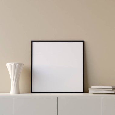 Modern and minimalist square black poster or photo frame mockup on the table in the living room. 3d rendering.