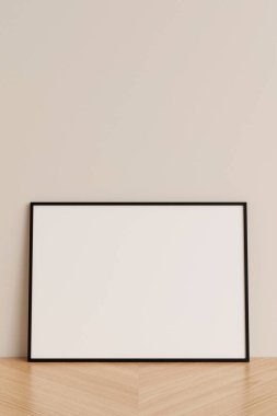 Temiz ve minimalist ön görüş yatay siyah fotoğraf veya ahşap zeminde duvara yaslanmış poster çerçeve modeli. 3d oluşturma.
