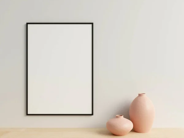 stock image Clean and minimalist front view vertical black photo or poster frame mockup hanging on the wall with vase. 3d rendering.