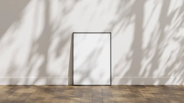 白い壁と太陽の影のオーバーレイと木製の床にフレームポスターモックアップ — ストック写真