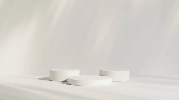 stock image Abstract white room with realistic white cylinder pedestal podium set and leaf shadow overlay. Minimal scene for product display presentation. geometric platform stage for showcase.