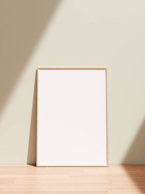 Oturma odasındaki ahşap zeminde duran gölgeli poster çerçevesi..