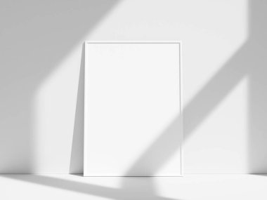 Pencere gölgesi olan beyaz duvara boş çerçeve