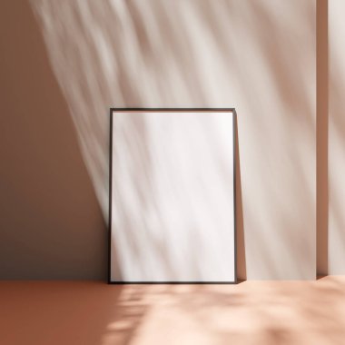 Poster çerçevesi, yerdeki pastel duvara yaslanmış, gölgeli.