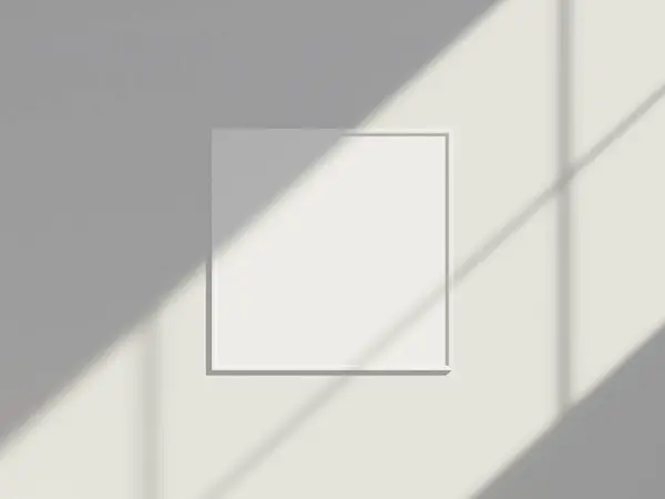 Frame mockup hanging on the wall with minimal window shadow