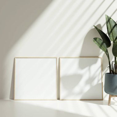 Gri duvardaki boş resim çerçevesi modeli. Beyaz oturma odası tasarımı. Modern İskandinav tarzı iç mekan ve sanat eserlerinin görüntüsü duvara yansıyor..