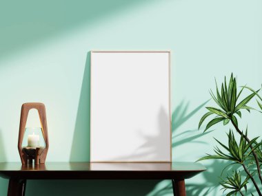 Nane yeşili bir duvara dayalı şık beyaz çerçeve, ahşap bir mum tutacağı ve yemyeşil bir bitki, yaratıcı tasarımları sergilemek için mükemmel..