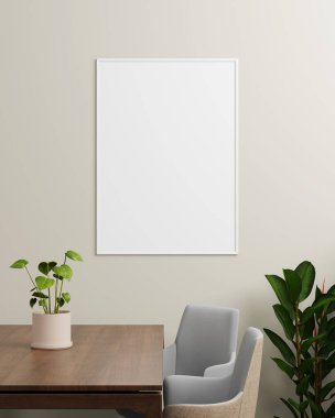 Masa, bitki ve sandalyelerle bej bir duvara asılmış beyaz bir fotoğraf çerçevesi tasarım ve fotoğrafçılık için sakin, minimalist bir arkaplan sunuyor.