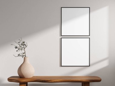 Bright square poster frame mockup with two white frames, creating a fresh aesthetic with a vase on a wooden table.