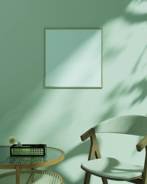 Yeşil bir duvarda çerçeveli bir alanı olan minimalist iç modelleme modern, rahat bir ortamda sanat sergilemek için tasarlandı..