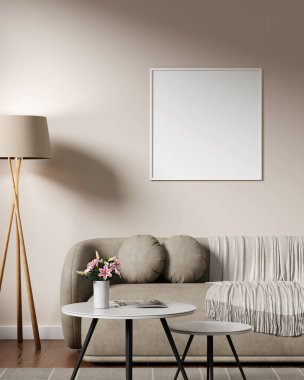 Duvarda kare beyaz çerçeve poster modeli ve şık oturma odası dekoru var..