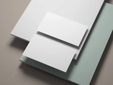 Profesyonel kartvizit modeli ışık pastel arka plan katmanlarının üzerine yerleştirilmiş.