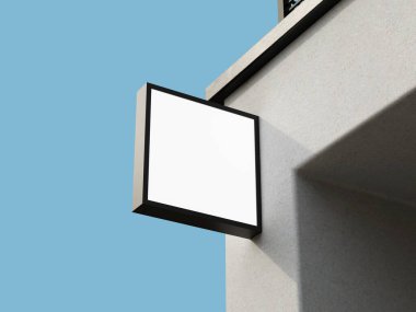 Bir binanın ön cephesine özel logo yerleştirmek için temiz, boş bir alanı olan zarif kare logo imzası..