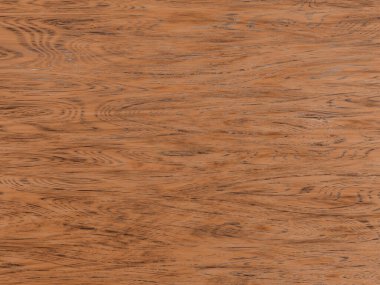 Ilık turuncu-kahverengi tonda zengin detaylı ahşap desenli..