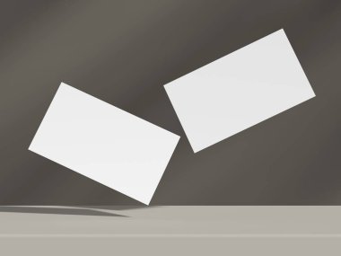 Tarafsız bir yüzey üzerinde dengeli bir perspektifte yükselen iki temiz kartvizit