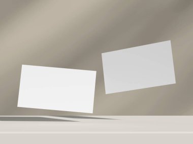 Bej-gri arka planda yumuşak gölgeli minimal tasarım içinde yüzen kartvizitler