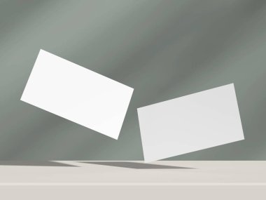 Yumuşak gri renkli kartvizit, yükselen efekt ve gerçekçi gölge.