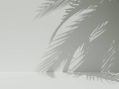 Palmiye yapraklarının yumuşak gölgeleri bej bir duvarda.