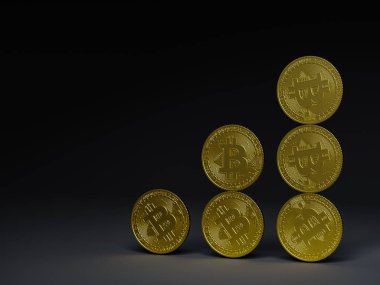 Üçgen şeklinde dizilmiş birkaç bitcoin para.
