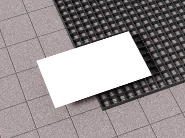 Siyah şebeke desenli desenli beton bir zemine yerleştirilmiş bir kartvizit..