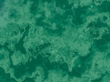 Değişik renklerde ve yumuşak geçişlerle eşsiz yeşil mermer dokusu.