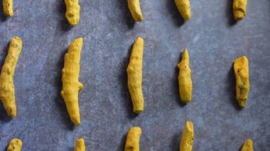 Raw whole dried Turmeric root