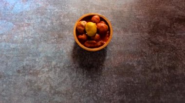 Indian traditional whole tender mango pickle