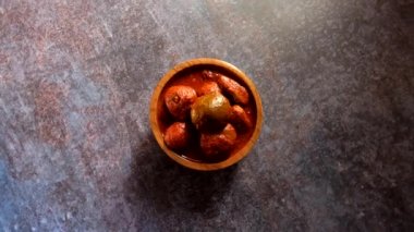 Indian traditional whole tender mango pickle