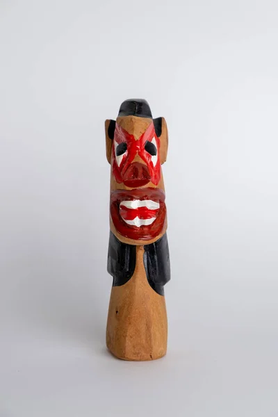 Wooden carved frown craft. In Brazilian folklore, the \