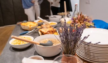 Decorated New Year's table with golden candles
