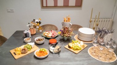Decorated New Year's table with golden candles