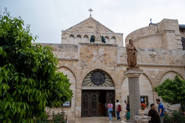 stock image Bethlehem, Palestine - 10 April, 2023. St. Catherine's Church entrance and the column with the figure of Saint Jerome