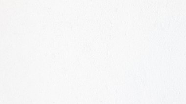 Gri beton duvar soyut bir arka plana ev sahipliği yapar.