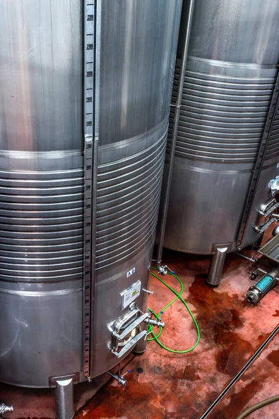 Wine fermentation tanks. Modern wine factory with new large tanks for the fermentation