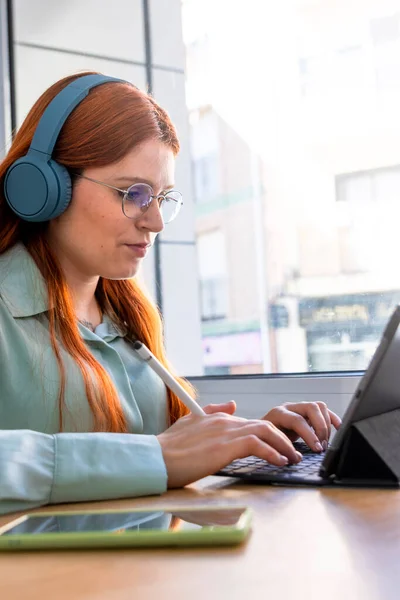 stock image Redhead Girl. Caffeinated Productivity: Beautiful Redhead Excelling in Remote Work