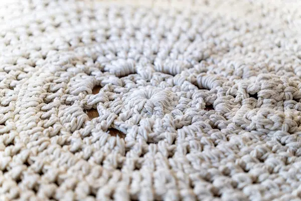 Crochet club. Knitted rug woven in the workshop.