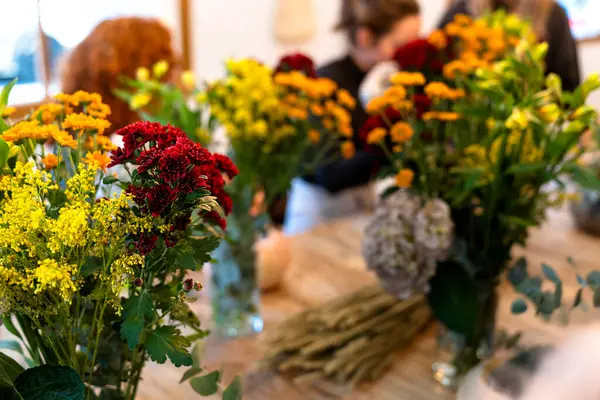 Natural flowers. Floral arrangement workshop with autumn flowers.